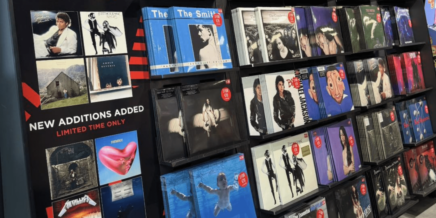 A wall of various different records.