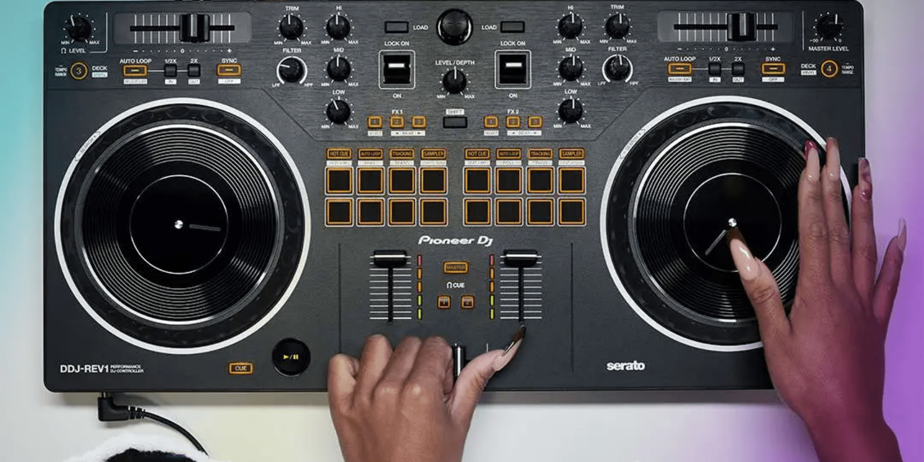 A woman using the turntables on a Pioneer DJ board.
